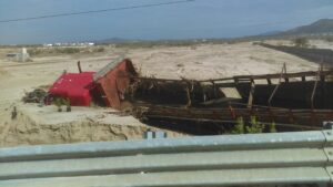 truck buried in mudslides